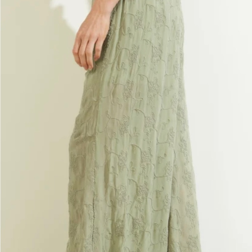 Dramatic wide-leg pants w/ smocked high-rise waistband, embroidered throughout.